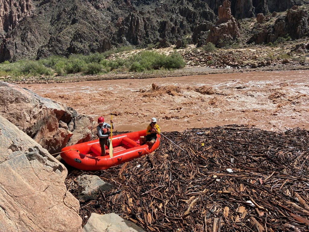 Searching Through Debris Along the Colorado River following the BA flooding