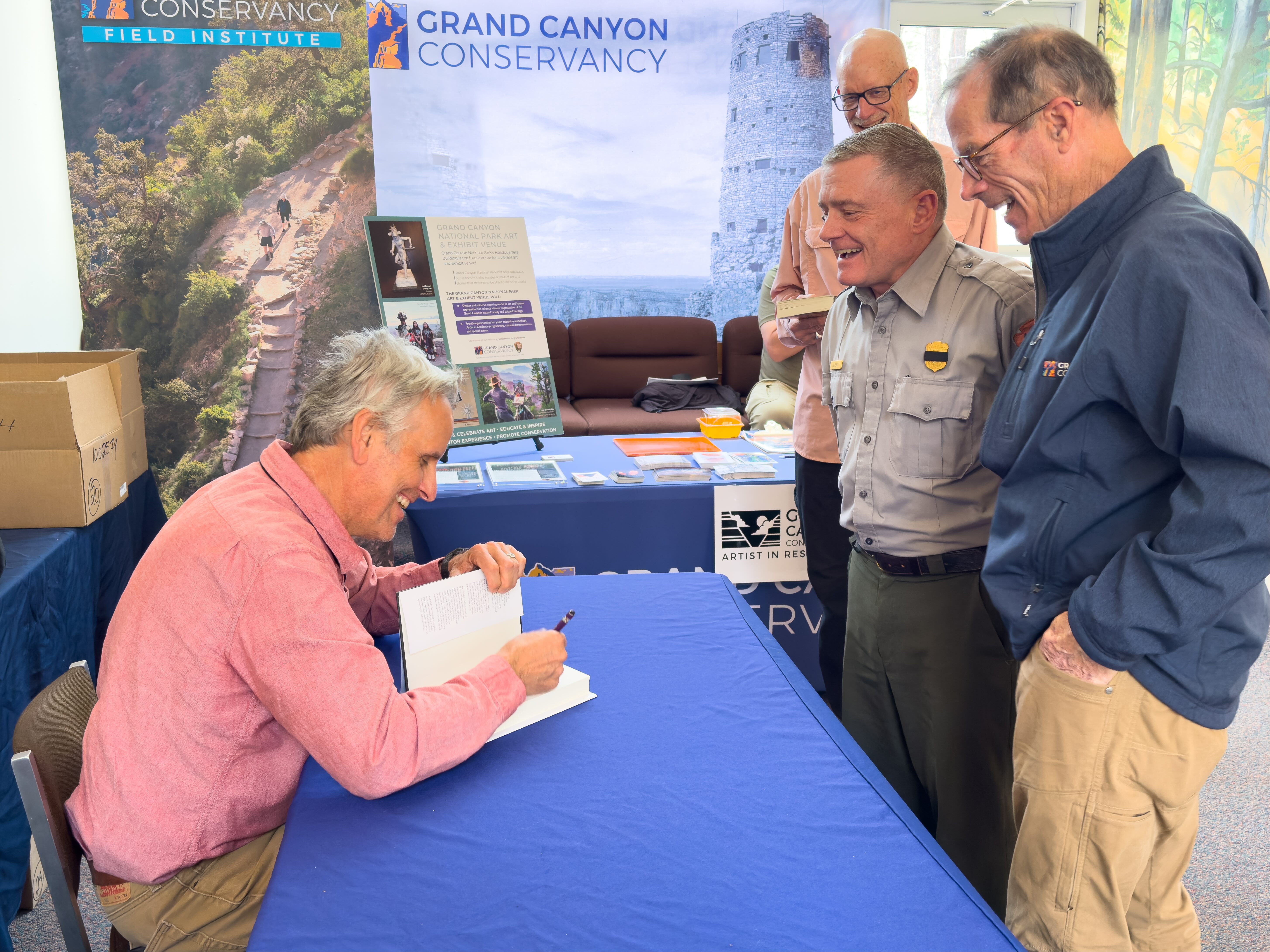 Dr. Tom Meyers signs his new book for the Superintendent of Grand Canyon.