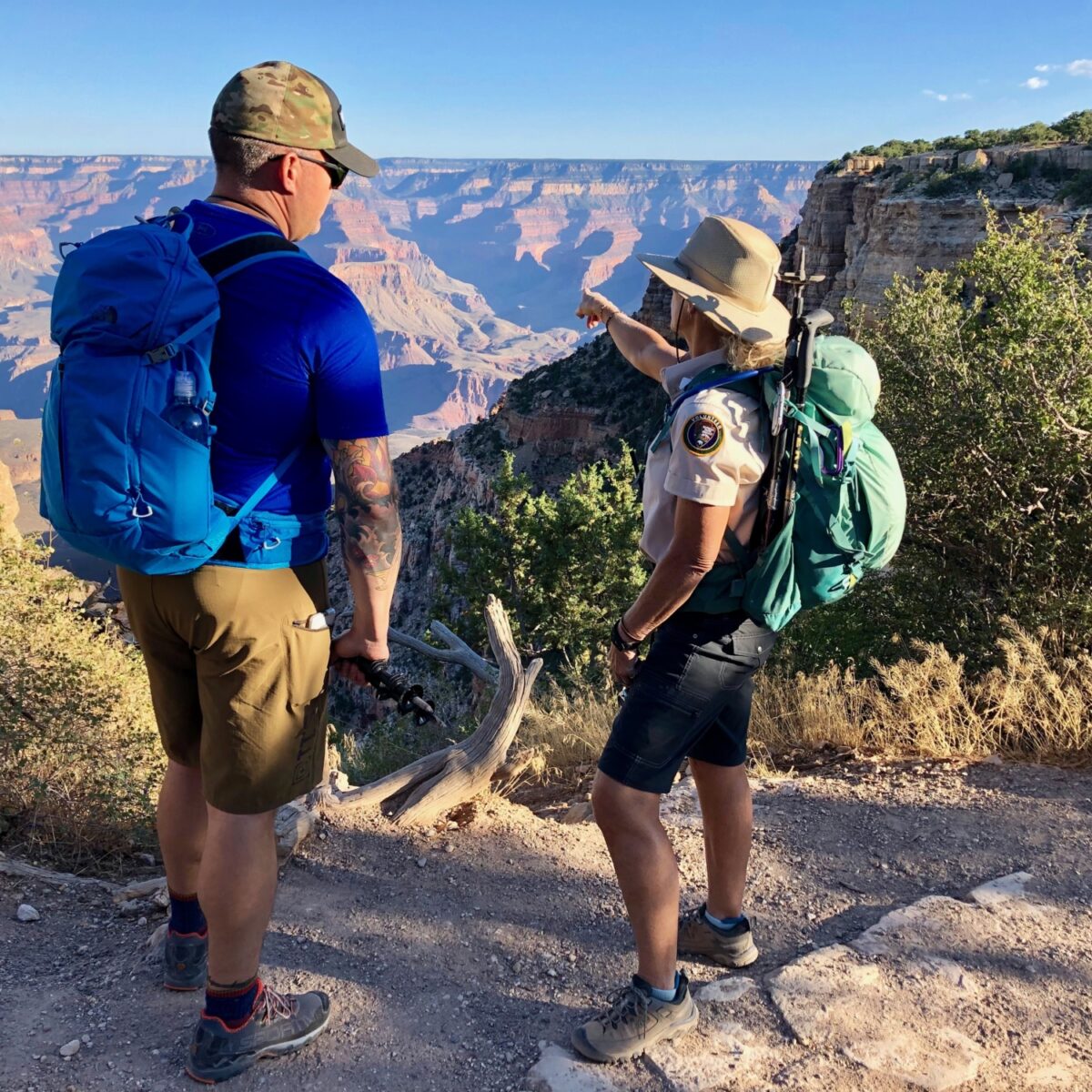 PSAR on the Upper Bright Angel
51298129175 7523bbded4 o
A Preventive Search and Rescue ranger talks with a hiker on the upper switchbacks of the Bright Angel Trail.
NPS Photo