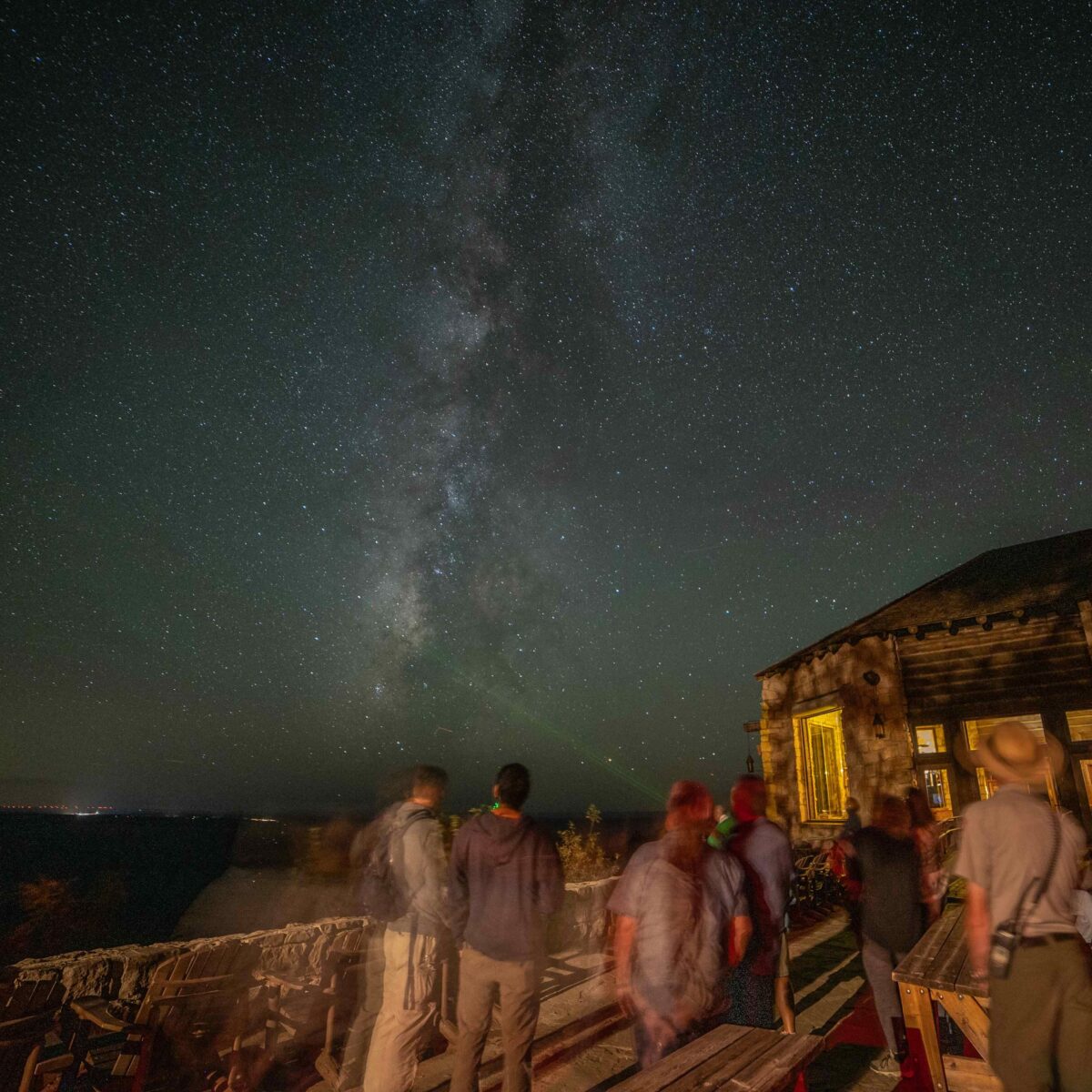 Dr. David Koerner points out objects in the sky using a laser pointer on the North Rim Lodge Veranda in October of 2024.