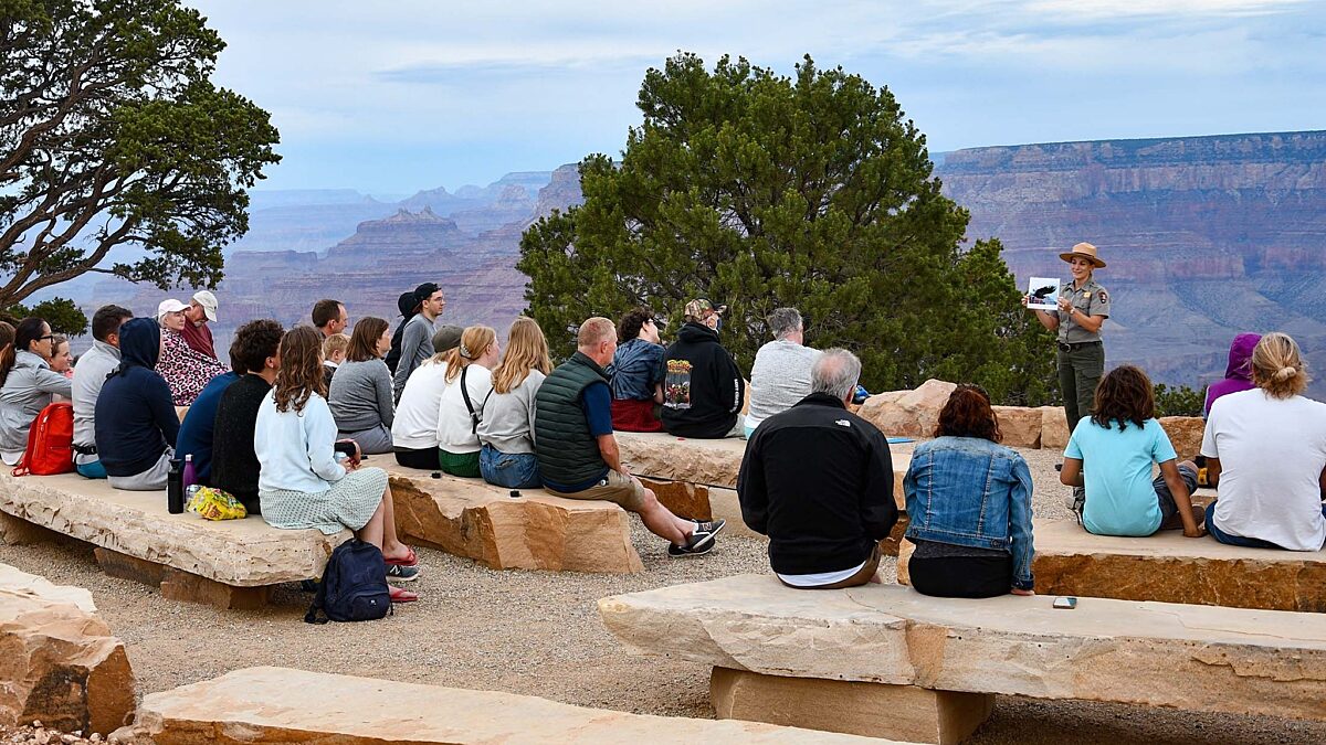 An Interpretation Ranger gives a Sunset Talk at the newly constructed Desert View Amphitheater on August 2, 2022. 

NPS Photo/M. Quinn
