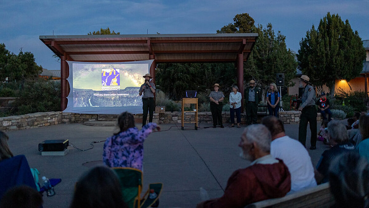 Dark Sky Ranger, Rader Lane speaks with visitors about the importance of dark skies at a program on the South Rim
