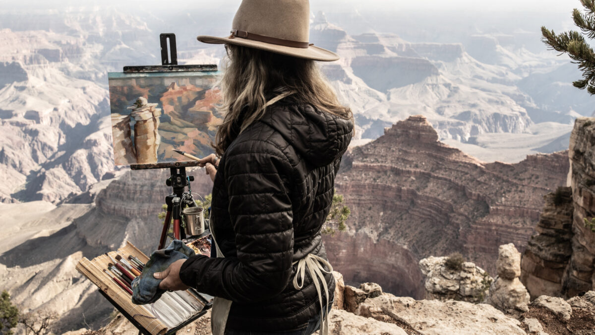 Woman painting on the South Rim of Grand Canyon