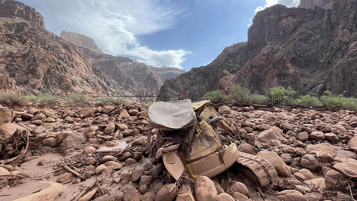 Excavator sits among debris following the Bright Angel flooding