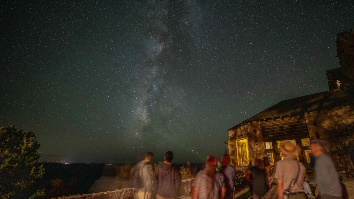 Dr. David Koerner points out objects in the sky using a laser pointer on the North Rim Lodge Veranda in October of 2024.