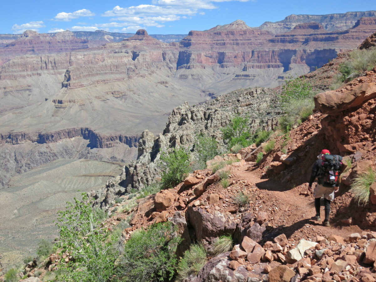 Hiker nearing Cathedral Stairs while descending the Hermit Trail. NPS Photo by Michael Quinn.