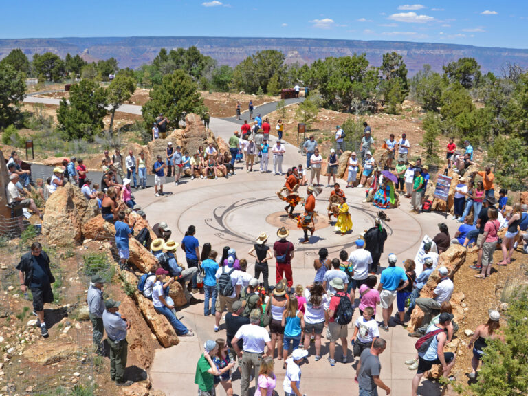The Pollen Trail Dancers perform a traditional dance at the Landmark and Tribal Medallion near Mather Point.