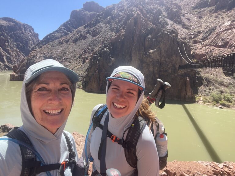 Helen and Lauren smiling on their rim to river adventure near the colorado river