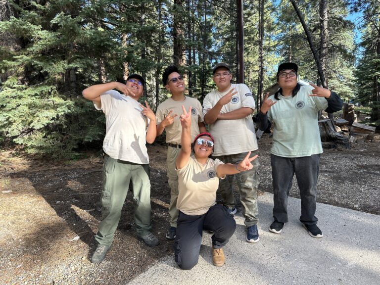 Ancestral Lands Conservation Corps smiles for the camera after finishing their tour on the north rim.