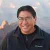 Lyle Balenquah smiling in front of Grand Canyon overlook