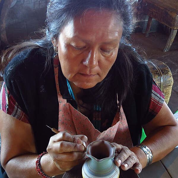 Dee Ann Dawson painting pot