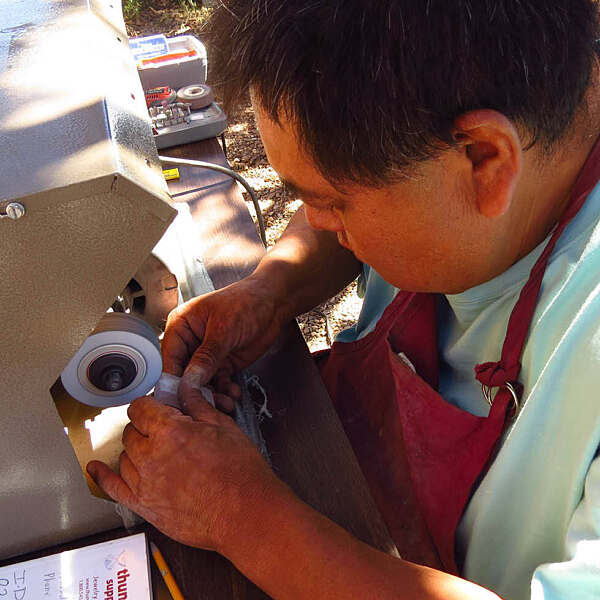 Waldo Davis working on spinning wheel art