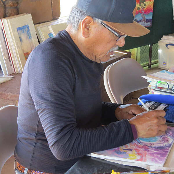 Baje Whitethorne Sr. working on artwork