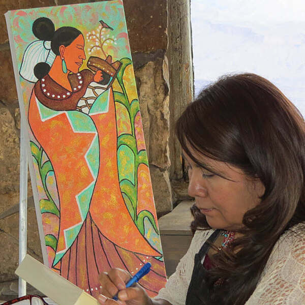 Beverly Blacksheep working on painting