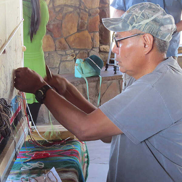 Bill Nez working on artwork