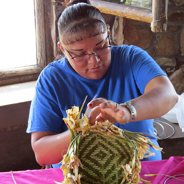 Clarissa Tungovia working on artwork