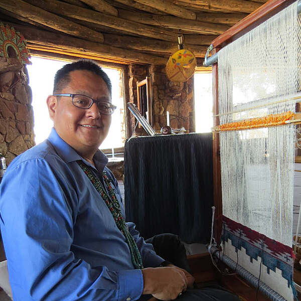 Gerard Begay working on artwork