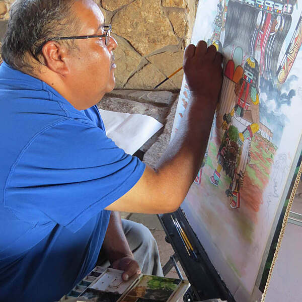 Jamie Cachini working on artwork