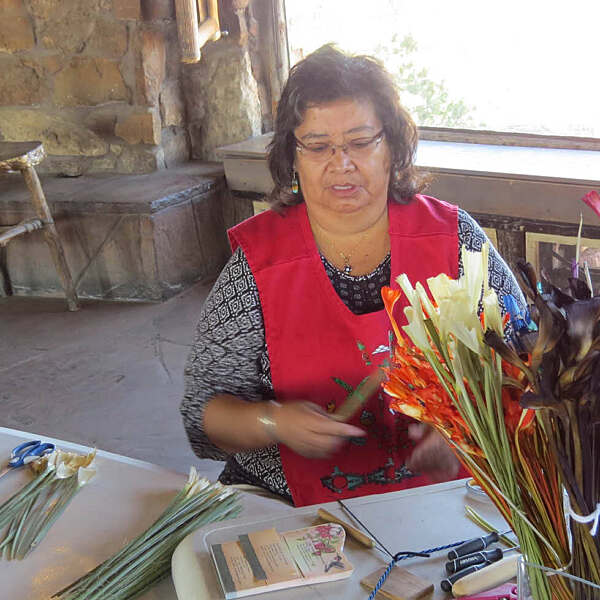 Zorina Laweka working on artwork